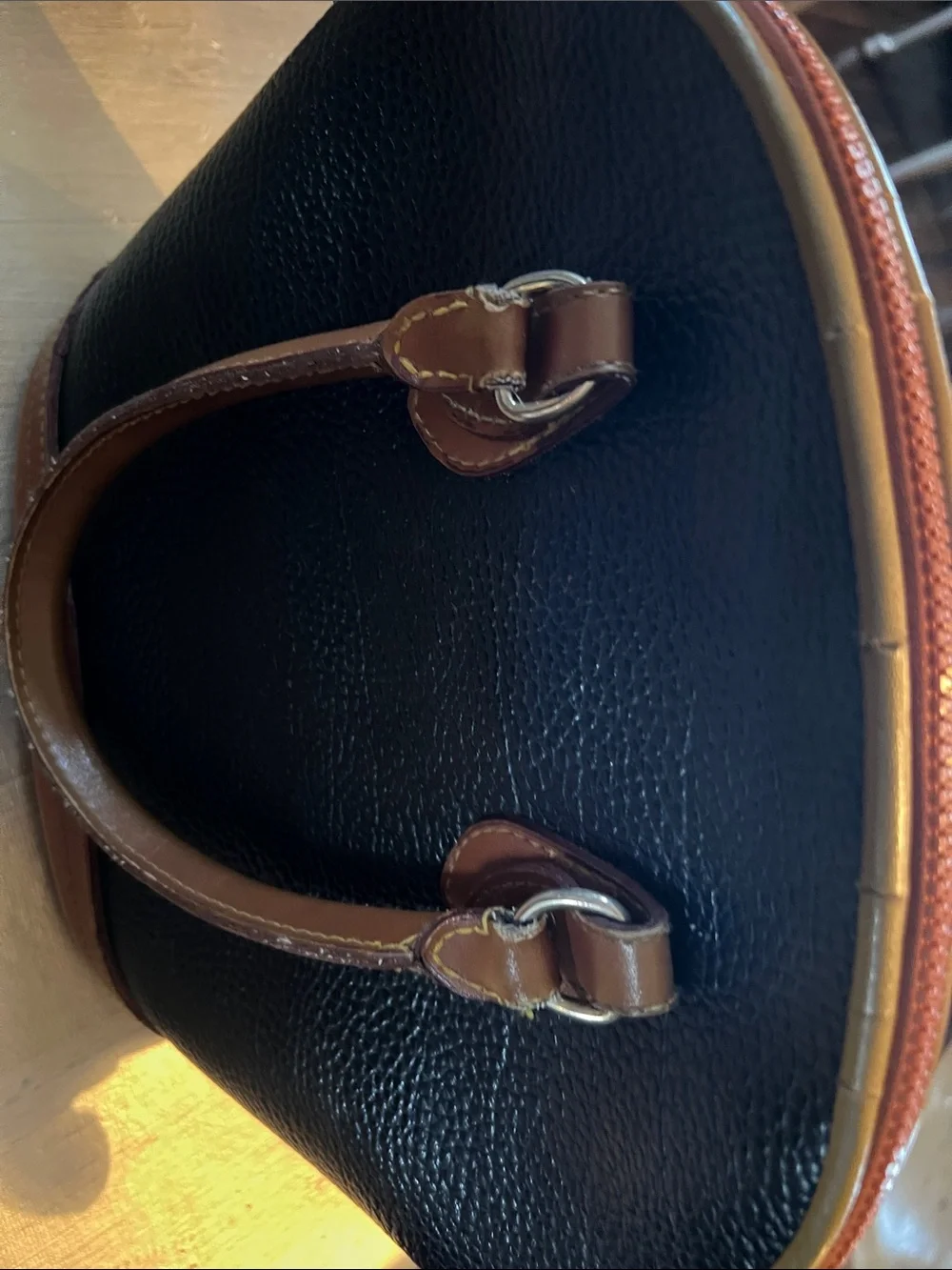 Dooney & Bourke Black Pebbled Leather Satchel with Brown Trim and Handles
